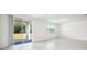 Bright living room with sliding door to patio at 28054 Poppy Ct, Leesburg, FL 34748