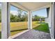 Private patio with paver stones and backyard views at 28054 Poppy Ct, Leesburg, FL 34748