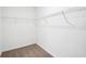 Large walk-in closet with wire shelving at 28054 Poppy Ct, Leesburg, FL 34748