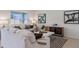 Light and airy living room featuring comfortable sofas and stylish decor at 3863 Rory Pond Ct, Lakeland, FL 33811
