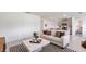 Living room with marble top coffee table and neutral color palette at 3863 Rory Pond Ct, Lakeland, FL 33811