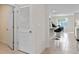 Hallway view of laundry room and kitchen at 3863 Rory Pond Ct, Lakeland, FL 33811