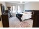 Large main bedroom with a king-size bed and ample closet space at 4420 Heritage Trl, Leesburg, FL 34748