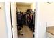 Spacious walk-in closet with ample shelving and hanging space at 4420 Heritage Trl, Leesburg, FL 34748