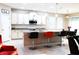 Spacious kitchen with granite counters, island, and stainless steel appliances at 4420 Heritage Trl, Leesburg, FL 34748