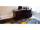 Bright home office with a large desk and comfortable seating at 4420 Heritage Trl, Leesburg, FL 34748