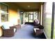 Cozy screened porch, perfect for outdoor relaxation at 4420 Heritage Trl, Leesburg, FL 34748