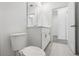 Clean bathroom with a toilet and white vanity at 4706 Jasmine Cir, Leesburg, FL 34748