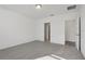 Light and airy bedroom with carpet flooring and access to bathroom at 4706 Jasmine Cir, Leesburg, FL 34748