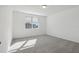 Spacious bedroom with carpet flooring and window with blinds at 4706 Jasmine Cir, Leesburg, FL 34748