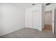Bright bedroom with carpet flooring and double door closet at 4706 Jasmine Cir, Leesburg, FL 34748