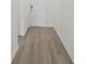 Light and airy entryway with wood-look flooring at 4706 Jasmine Cir, Leesburg, FL 34748
