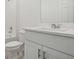 Clean bathroom with white vanity and quartz countertop at 4710 Jasmine Ct, Leesburg, FL 34748