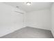 Bedroom with grey carpet and double door closet at 4710 Jasmine Ct, Leesburg, FL 34748