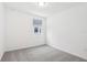 Bright bedroom with grey carpet and window coverings at 4736 Jasmine Cir, Leesburg, FL 34748