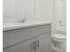 Clean bathroom with grey vanity and a bathtub at 4751 Jasmine Cir, Leesburg, FL 34748