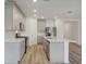 Modern kitchen with stainless steel appliances and an island at 4751 Jasmine Cir, Leesburg, FL 34748
