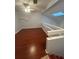 Spacious loft bedroom with wood flooring and a ceiling fan at 174 Waterfall Way # 106, Altamonte Springs, FL 32714