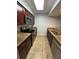Galley kitchen with stainless steel appliances at 174 Waterfall Way # 106, Altamonte Springs, FL 32714