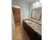Bathroom features vanity with granite countertop at 174 Waterfall Way # 106, Altamonte Springs, FL 32714