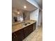 Kitchen with granite countertops and a view of the living room at 174 Waterfall Way # 106, Altamonte Springs, FL 32714