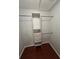 Well-organized closet with built-in shelves and rods at 174 Waterfall Way # 106, Altamonte Springs, FL 32714