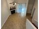 Bright living room with a fireplace and tile floors at 174 Waterfall Way # 106, Altamonte Springs, FL 32714