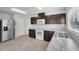 Modern kitchen with stainless steel appliances and white cabinets at 216 Miles Ct, Davenport, FL 33837