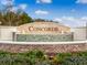 Concorde community entrance with a water fountain at 3443 Fort Mellon Ln, Sanford, FL 32773