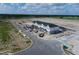 Aerial view of townhouses under construction, showing the building's exterior and surrounding area at 5312 Center Lake Ranch Blvd, St Cloud, FL 34771