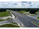 Aerial view of a new road intersection with landscaping at 5312 Center Lake Ranch Blvd, St Cloud, FL 34771