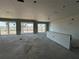Unfinished main living space with drywall and multiple windows at 5385 Park Guell St, St Cloud, FL 34771
