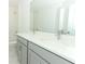 Bathroom with double vanity and quartz countertop at 7916 Waterfield Ave, Orlando, FL 32832