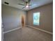 Bedroom with carpet, ceiling fan, and window at 0 Iron Bridge Rd, Oviedo, FL 32765