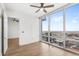 Bright bedroom with hardwood floors and city view at 150 E Robinson St # 3208, Orlando, FL 32801