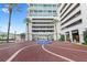 High-rise building with fountain and palm trees at 150 E Robinson St # 3208, Orlando, FL 32801