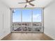 Bedroom with large windows offering city views at 150 E Robinson St # 3208, Orlando, FL 32801