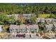 Aerial view of community of townhouses near lush greenery at 4522 Brook Hollow Cir, Winter Springs, FL 32708