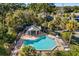 Inviting community pool with surrounding patio and gazebo at 4522 Brook Hollow Cir, Winter Springs, FL 32708