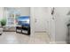 Open entryway with television and storage at 4522 Brook Hollow Cir, Winter Springs, FL 32708