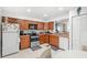 L-shaped kitchen with stainless steel appliances at 4522 Brook Hollow Cir, Winter Springs, FL 32708