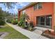 View of townhome's exterior with walkway and landscaping at 4786 Tangerine Ave # 4786, Winter Park, FL 32792