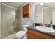 Clean bathroom with a large walk-in shower and granite vanity at 4786 Tangerine Ave # 4786, Winter Park, FL 32792