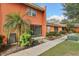 Exterior view of townhome, showcasing landscaping at 4786 Tangerine Ave # 4786, Winter Park, FL 32792