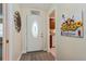 Bright and welcoming entryway with wood-look floors at 1136 Villa Ln # 96, Apopka, FL 32712