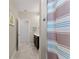 Clean bathroom with shower and vanity at 1142 Trappers Trail Loop, Davenport, FL 33896