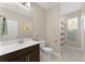 Bathroom with single vanity, toilet and shower/tub combo at 1142 Trappers Trail Loop, Davenport, FL 33896