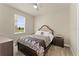 Bedroom with queen bed and ceiling fan at 1142 Trappers Trail Loop, Davenport, FL 33896