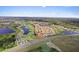Aerial view of the house and community at 1142 Trappers Trail Loop, Davenport, FL 33896