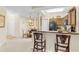 Kitchen with breakfast bar and modern appliances at 12843 Madison Pointe Cir # 107, Orlando, FL 32821